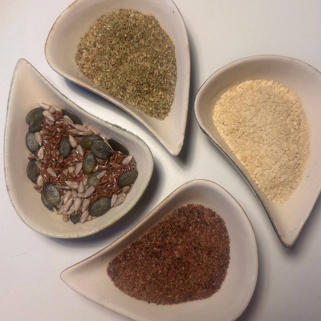 jao ingredients in four dishes: nooch, seeds, herbs, smoked paprika